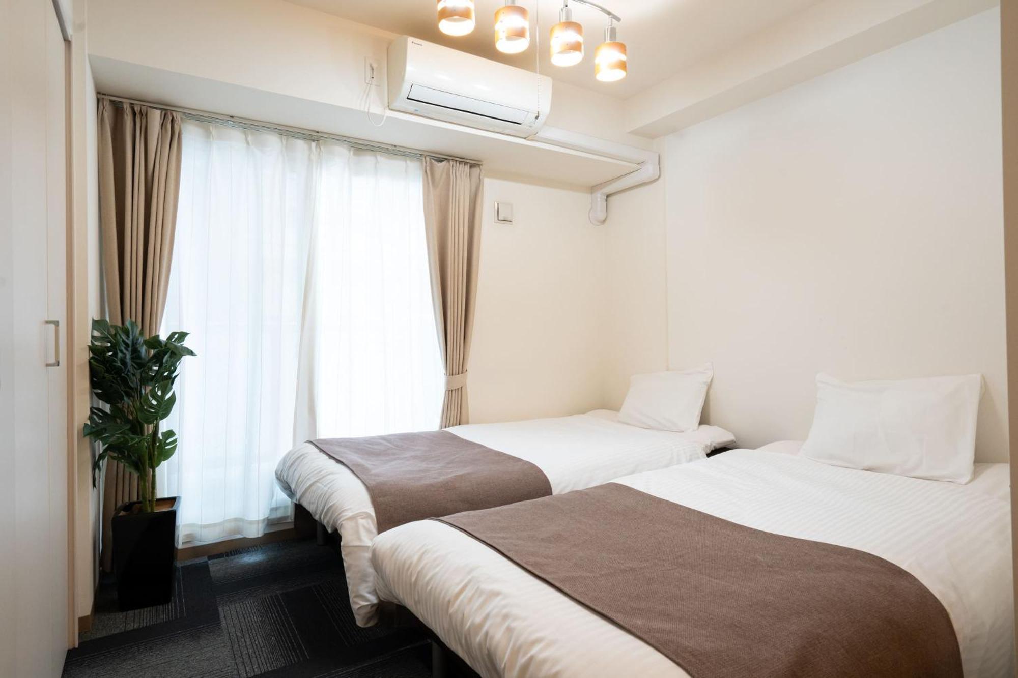 Tsubaki Garden Sapporo Quarto foto